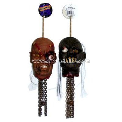 Shaking Voodoo Heads With Chains