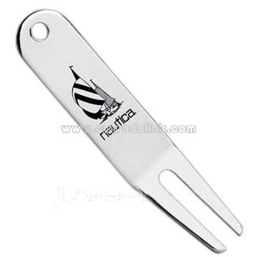 Silver-tone divot repair tool.