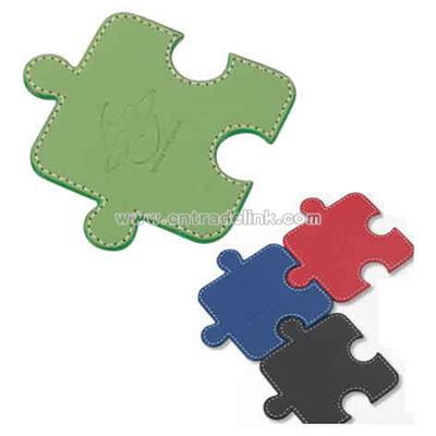 Single connectible puzzle shape leatherette coaster set