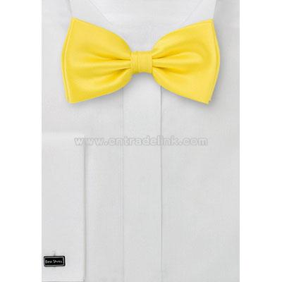 Solid bright lemon yellow bow tie.