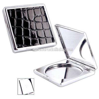 Standard square and magnifying round mirror