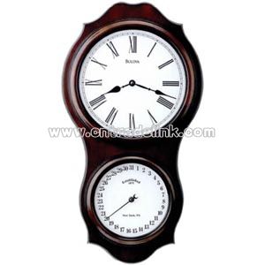 Wall clock in wood case