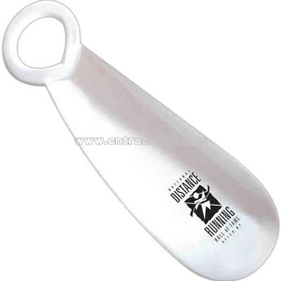 White plastic shoe horn