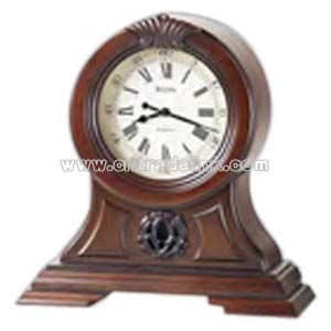 clock is in a solid wood